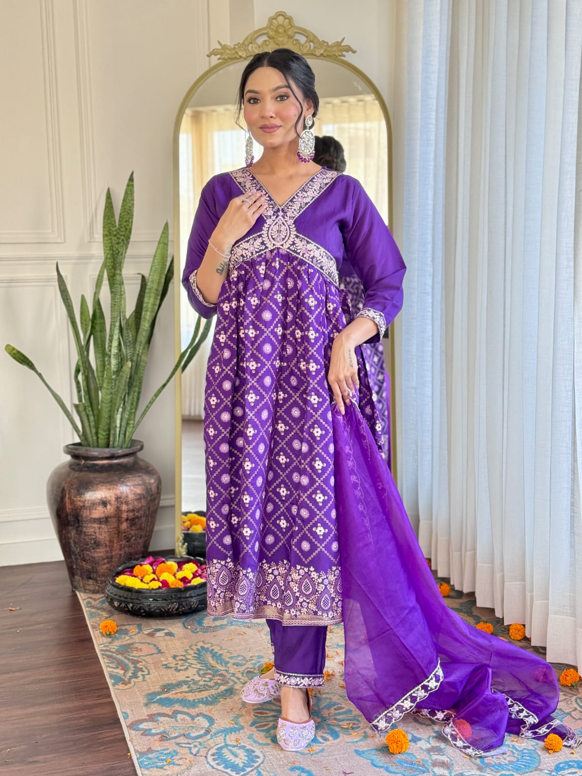 Charming purple embroidered kurta suit with matching dupatta and pants