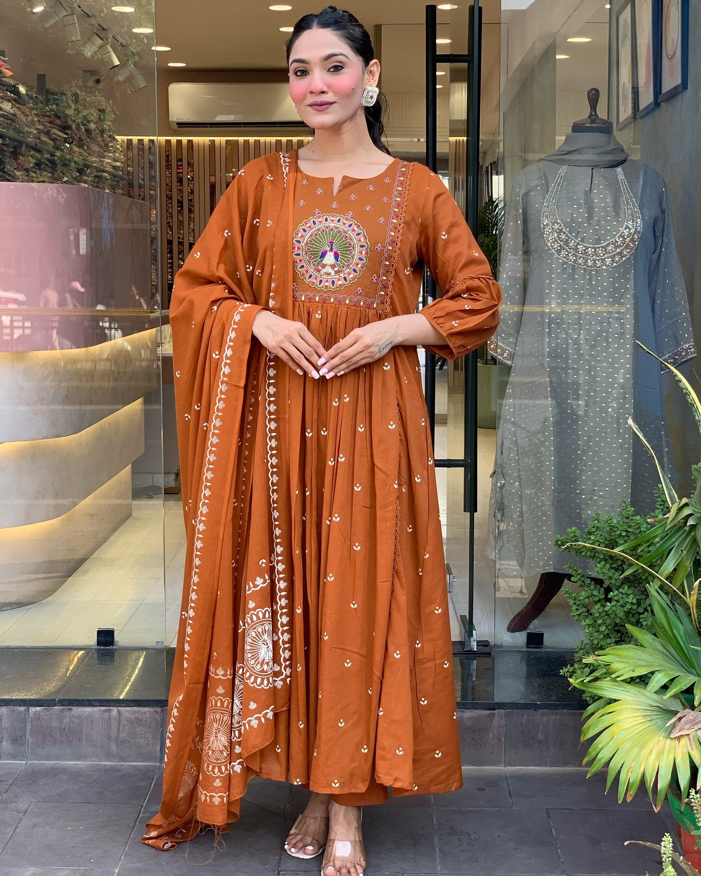 Traditional embroidered Anarkali set with dupatta and stylish design