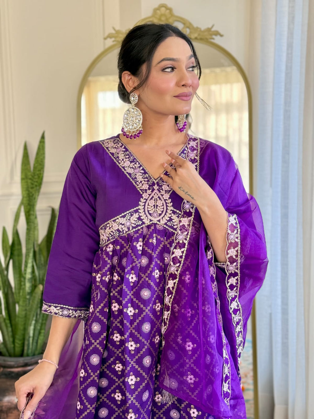 Charming purple embroidered kurta suit with matching dupatta and pants