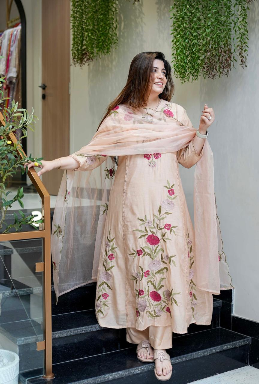 Graceful embroidered ethnic wear in soft pastel with sheer dupatta