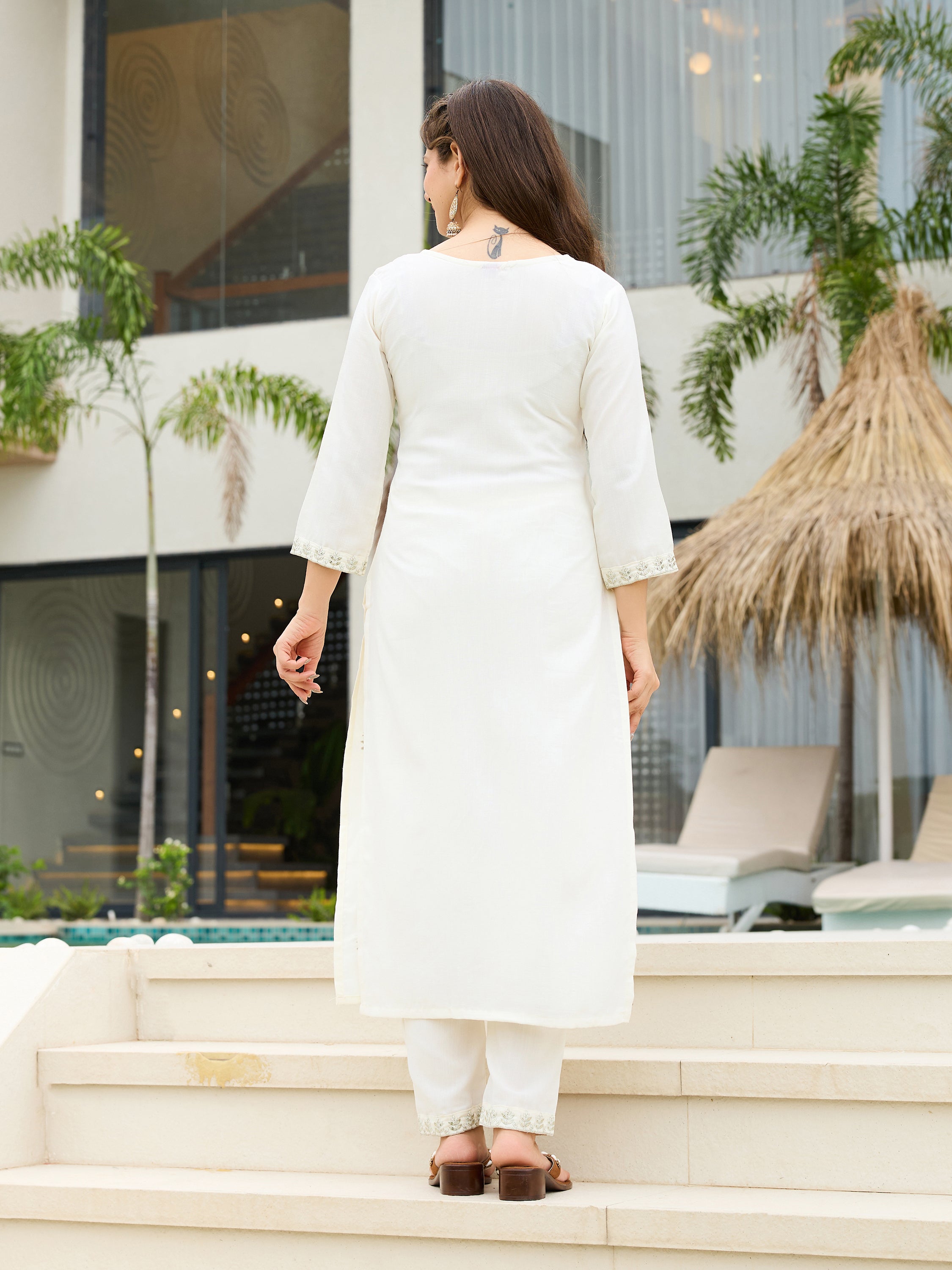 Traditional festive kurta ensemble featuring embroidery and matching dupatta
