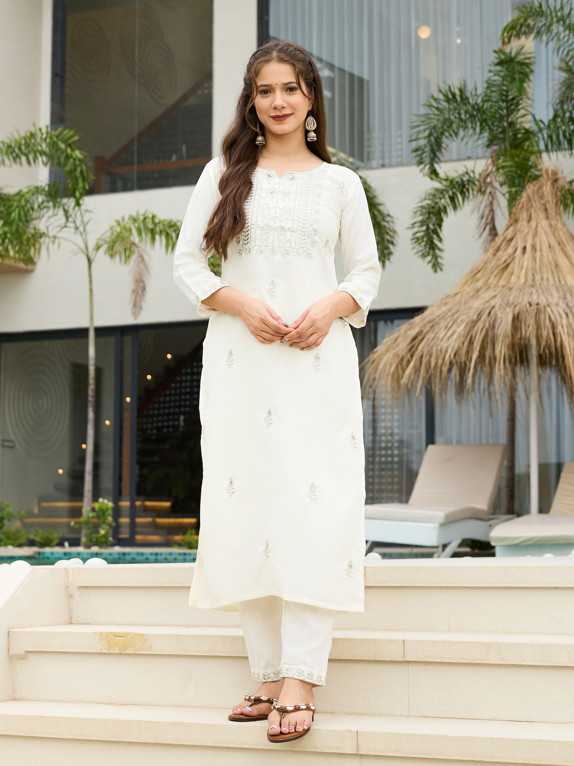 Traditional festive kurta ensemble featuring embroidery and matching dupatta
