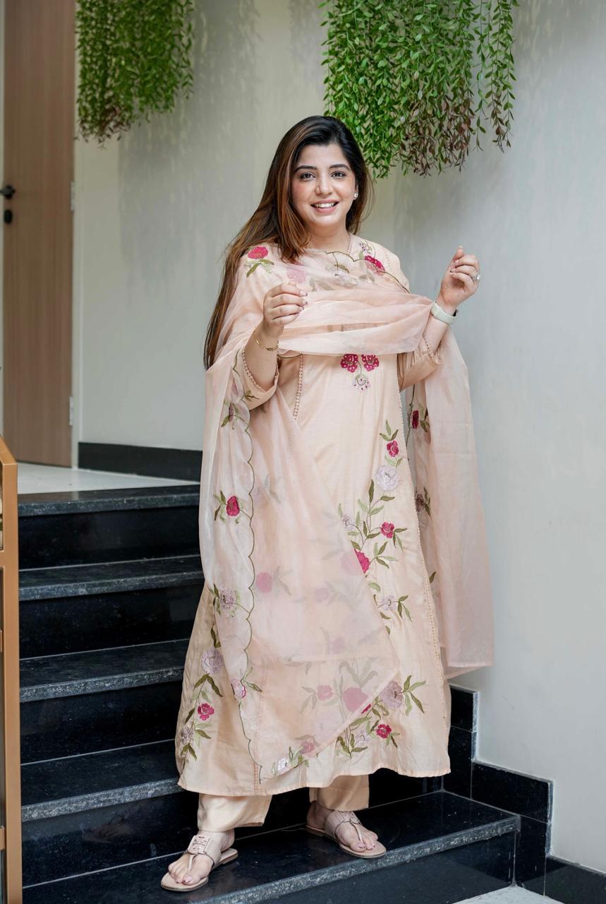Graceful embroidered ethnic wear in soft pastel with sheer dupatta