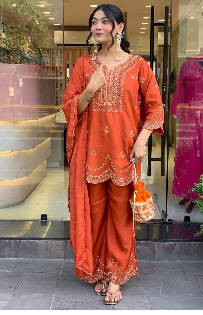 Rust Orange Embroidered Three-Piece Suit with Dupatta & Potli Bag