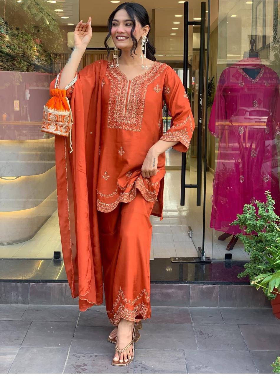 Rust Orange Embroidered Three-Piece Suit with Dupatta & Potli Bag